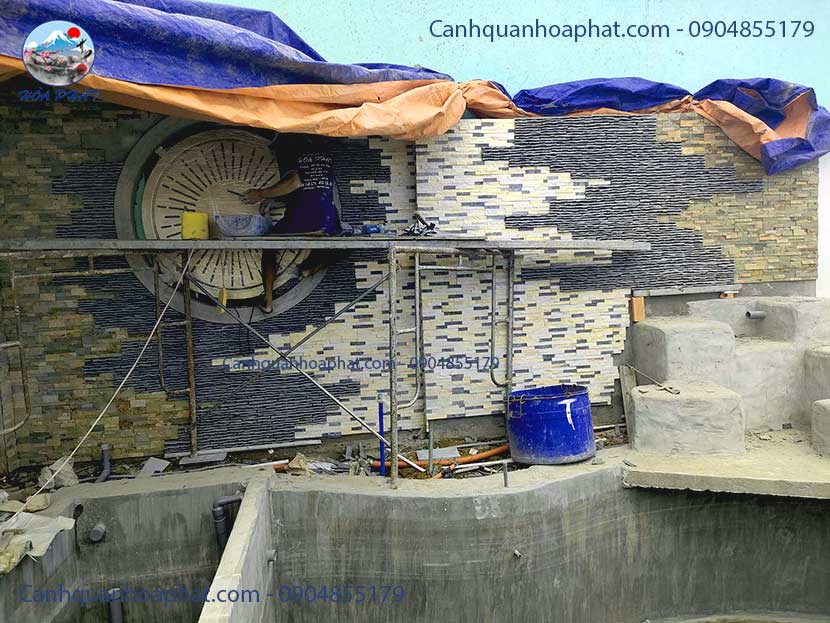 xây bệ đỡ và dán đá dán tường trang trí