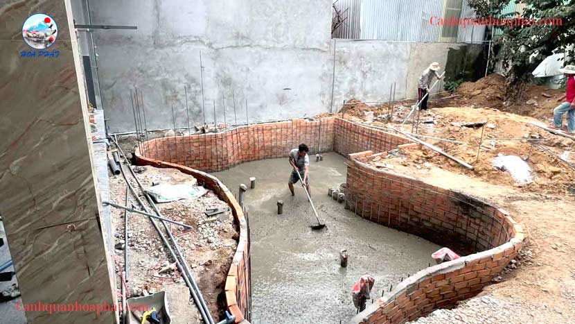 đổ bê tông đáy hồ hòa phát